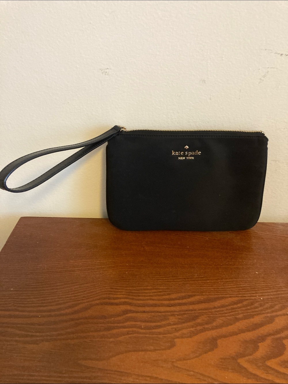 kate spade Black Leather Wristlet Pouch with Gold Logo